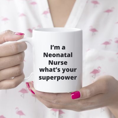 Neonatal Nurse - What's your superpower_11oz white mug nurse holding_Lt Handled_MG_7876-800x800